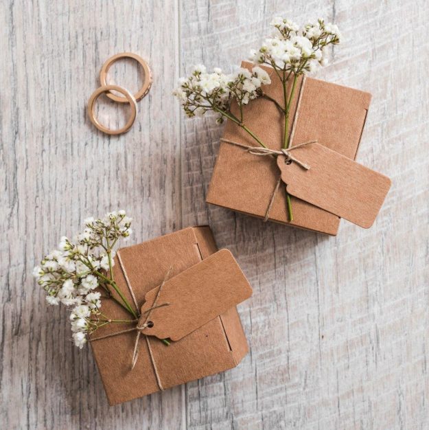 weeding-rings-with-cardboard-boxes-on-wooden-plank